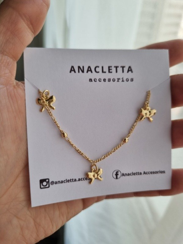 Producto - Pulsera coquete moños multidije enchapada en oro