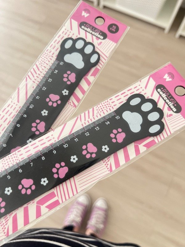 Producto - Regla huellita negro