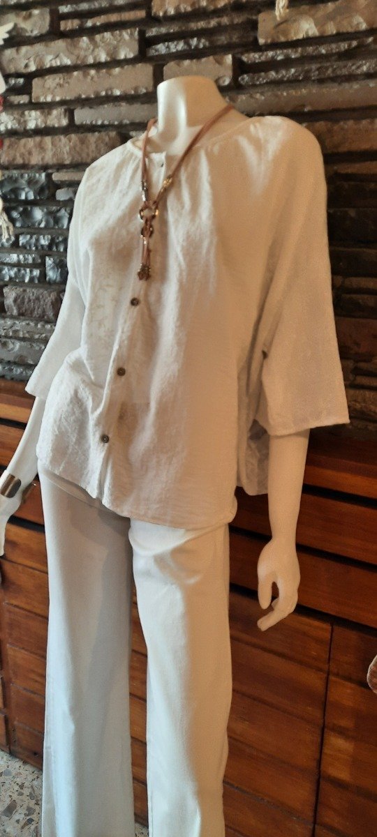 Producto - Blusa amplia bordada