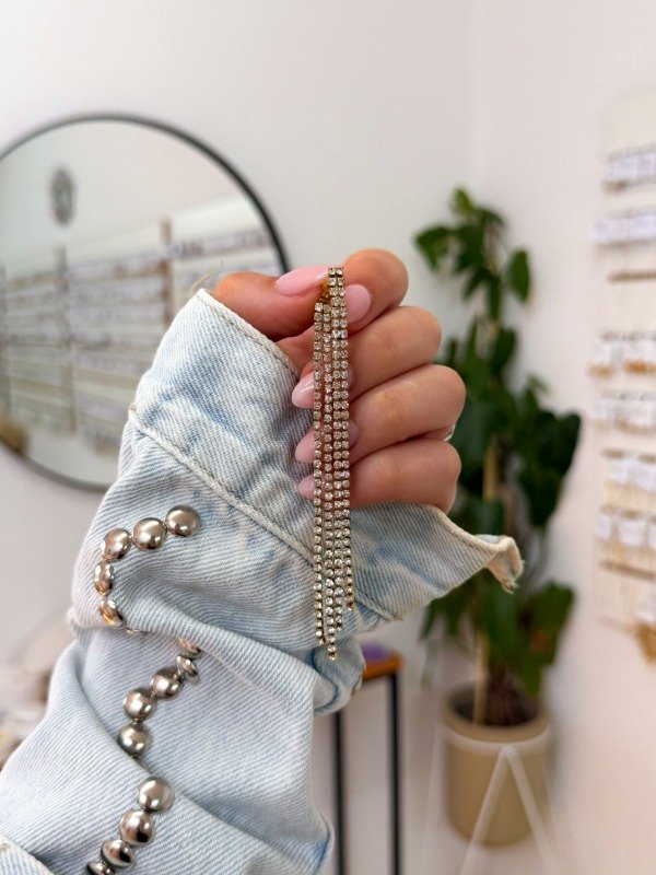 Producto - Arito acero dorado doble tira strass largas