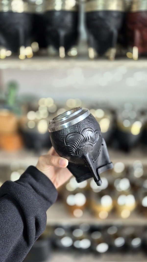 Producto - Torpedo acero con cuero dibujado.