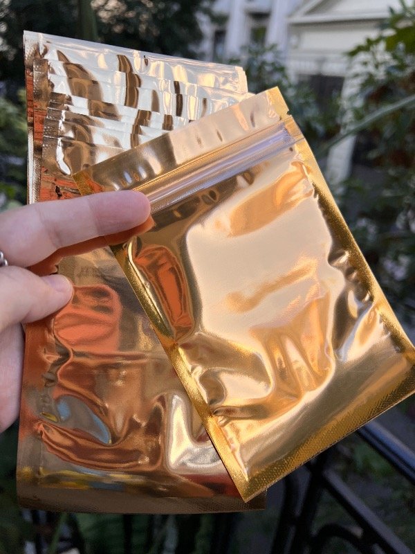 Producto - 10 bolsitas doradas con cierre 10x15