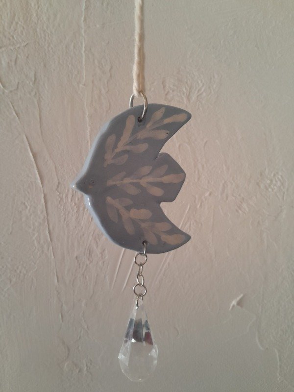 Producto - Atrapasol - Pajaro