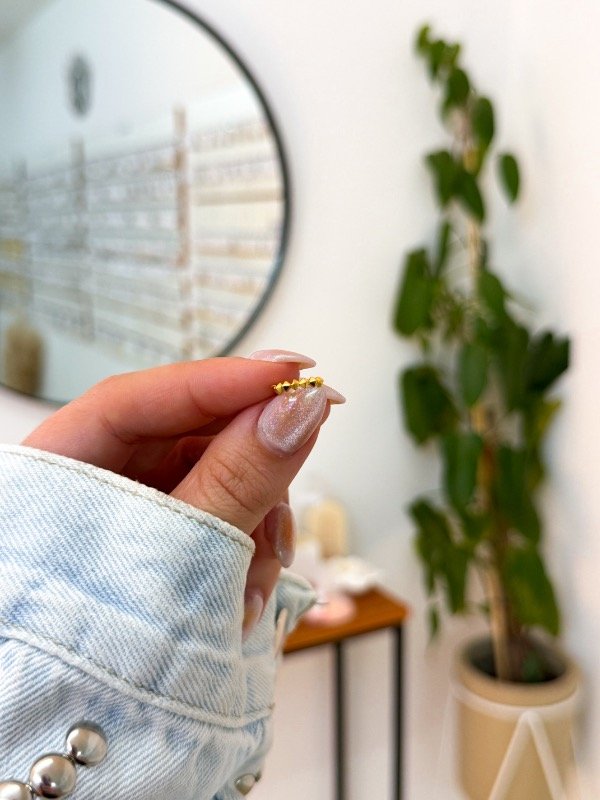 Producto - Ear cuff acero dorado pinchos