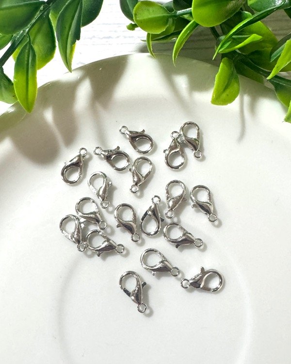 Producto - MOSQUETÓN NIQUEL 12MM