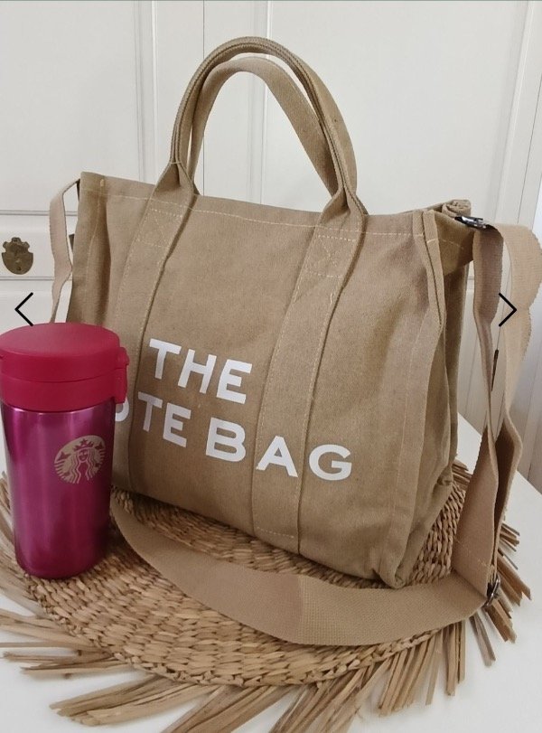 Producto - Bolso cartera de tela de Lona c/correa regulable, bolsillos c/cierre por dentro
