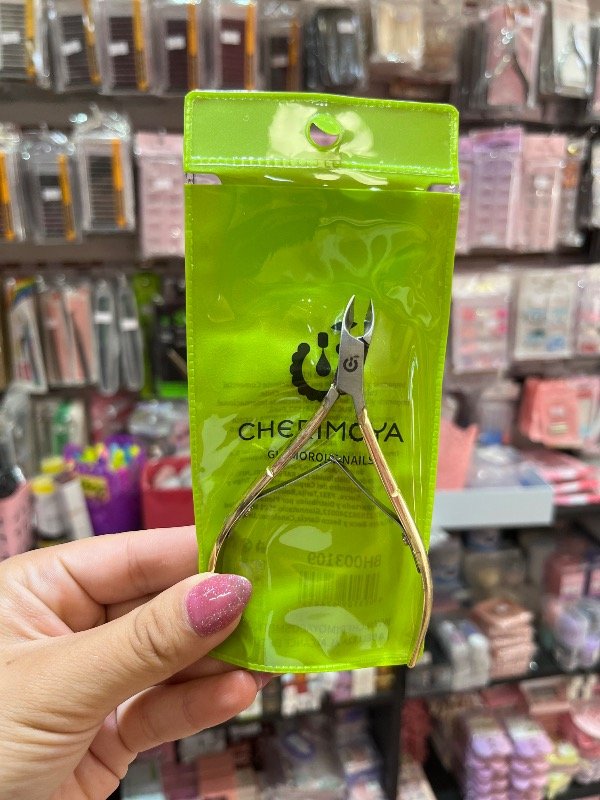 Producto - Corta cutícula dorado cherimoya bolsa verde