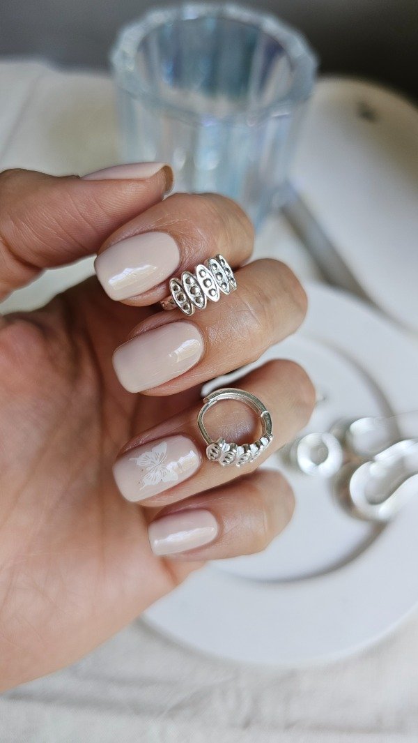 Producto - Aros huggies oval puntillismo 1cm. Plata