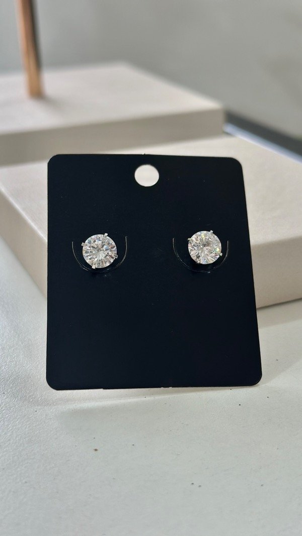 Producto - Aros punto de luz  G con cuatro engarces laminados en rodio