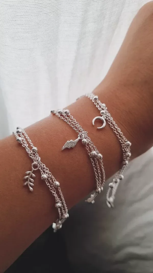 Producto - Pulseras triples con bolitas y dijee AB