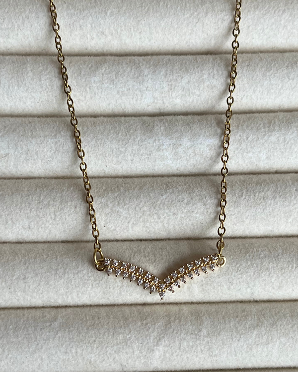 Producto - Cadena con dije abanico de acero dorado 43cm