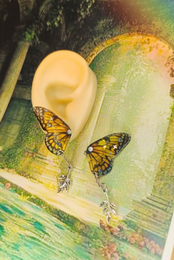 Producto - Aros a presión mariposa amarilla