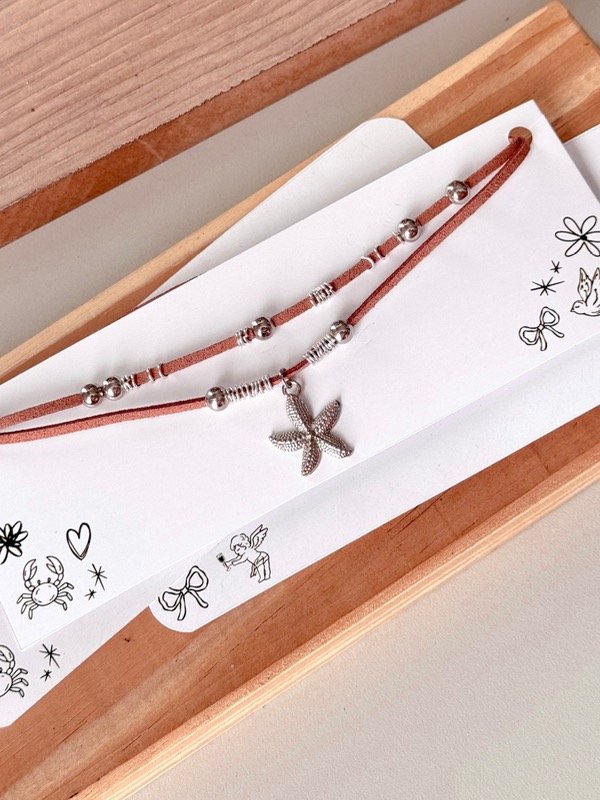 Producto - Choker estrella mar marron
