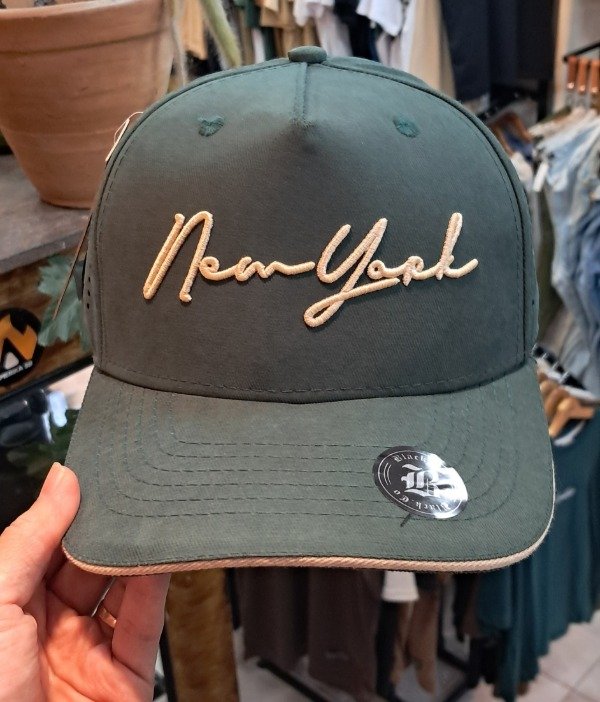 Producto - CAP NY CURSIVA