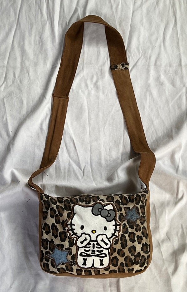 Carterita Kitty animal print multicolor