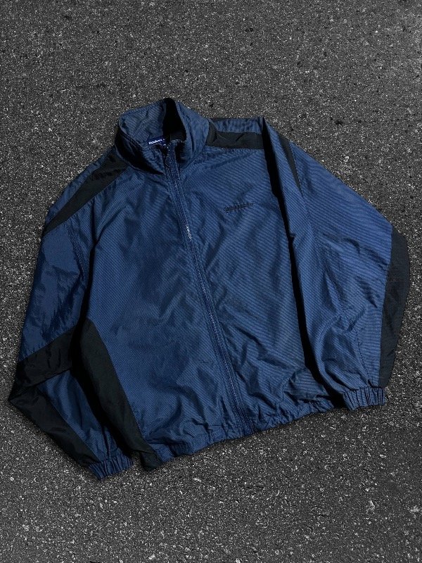 Producto - REEBOK ROMPEVIENTOS VINTAGE IMPERMEABLE RETRO OG