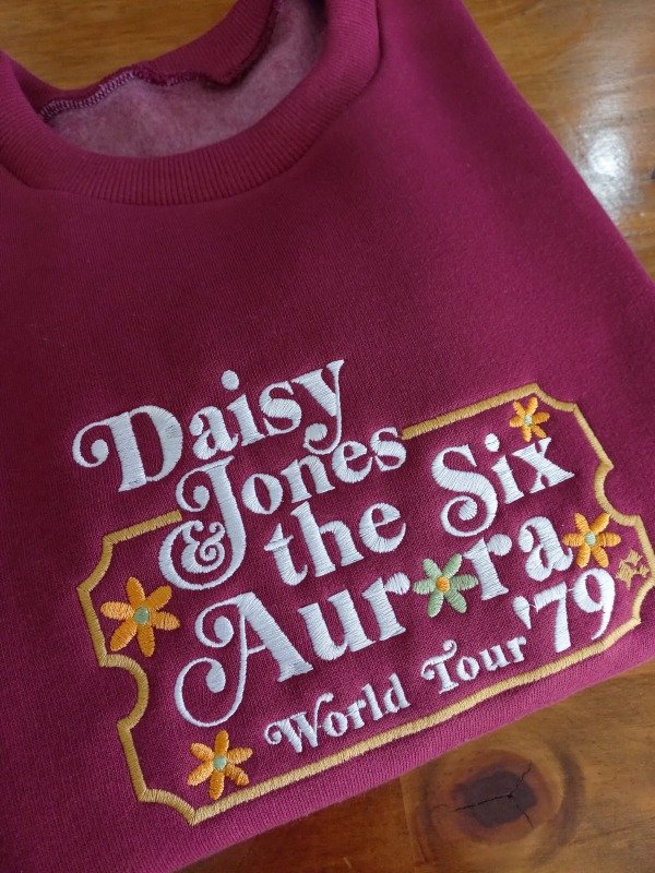 Producto - Buzo Daisy Jones ticket