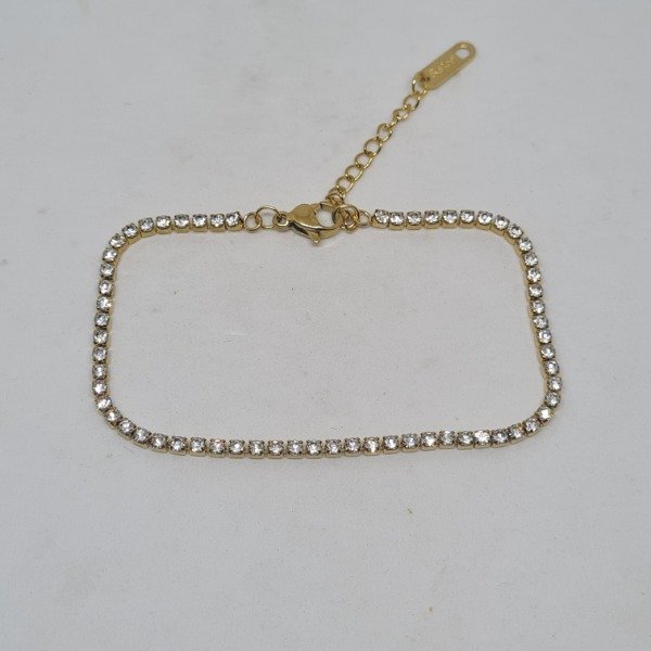 Producto - Pulsera dorada con cubics blanco
