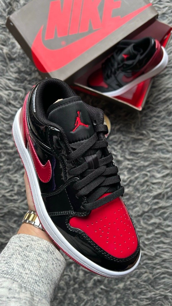 Producto - JORDAN RETRO 1 LOW BRED PATENT - 1