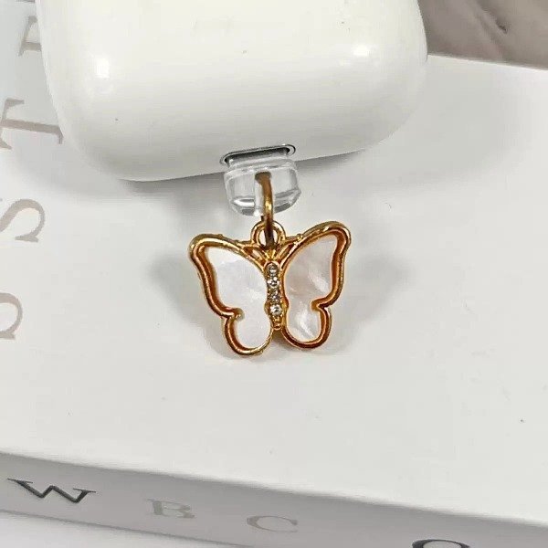 Producto - Anti polvo mariposa blanca (entrada lightning y usb-c)