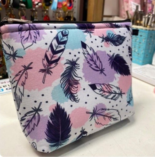 Producto - Neceser chicos plumas