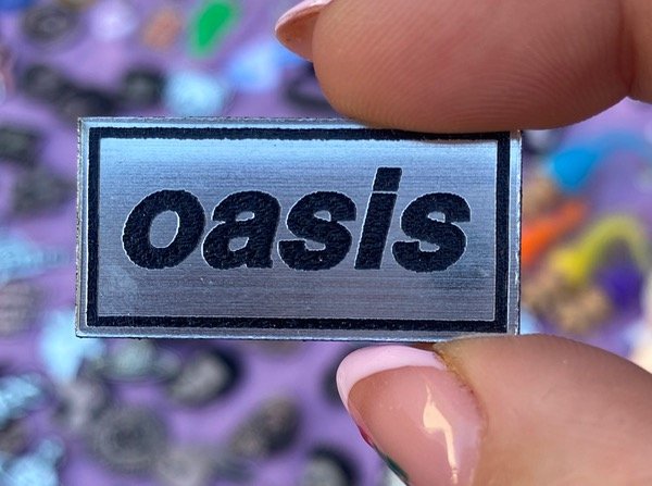 Producto - prendedor oasis