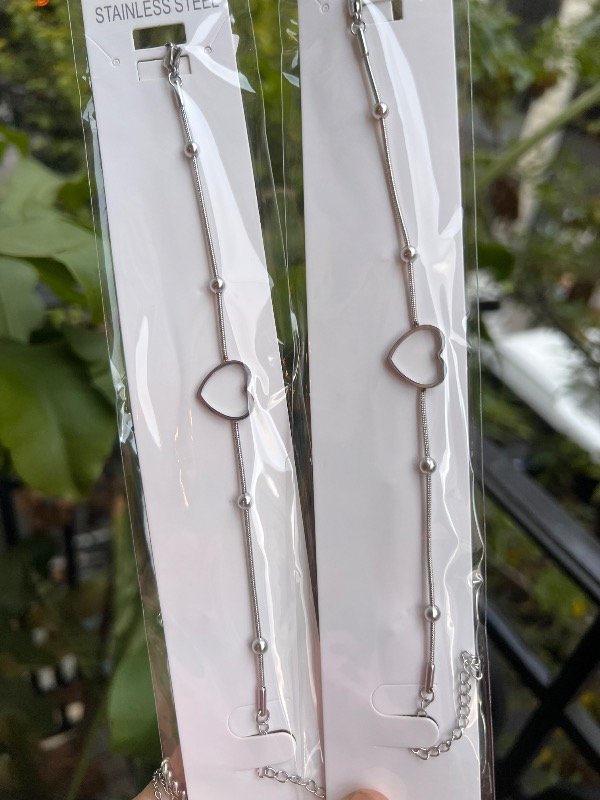 Producto - 2 pulseras de acero cola de ratón con corazón