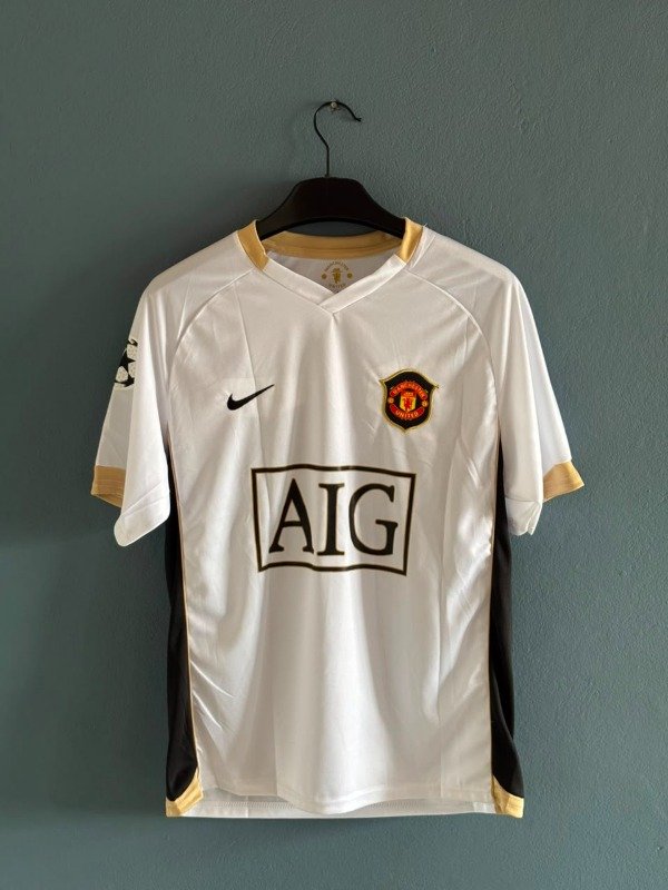 Producto - CAMISETA RETRO MANCHESTER UNITED SUPLENTE 2006-07
