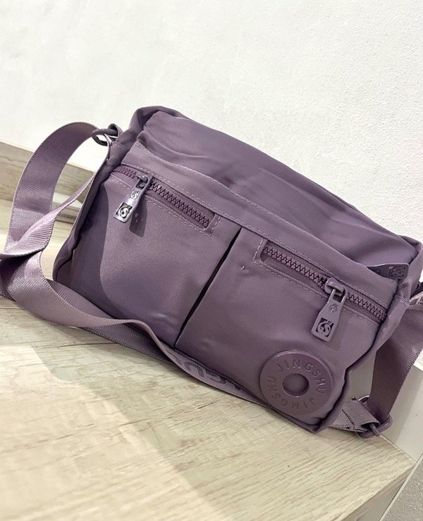 Producto - Bandolera impermeable lila