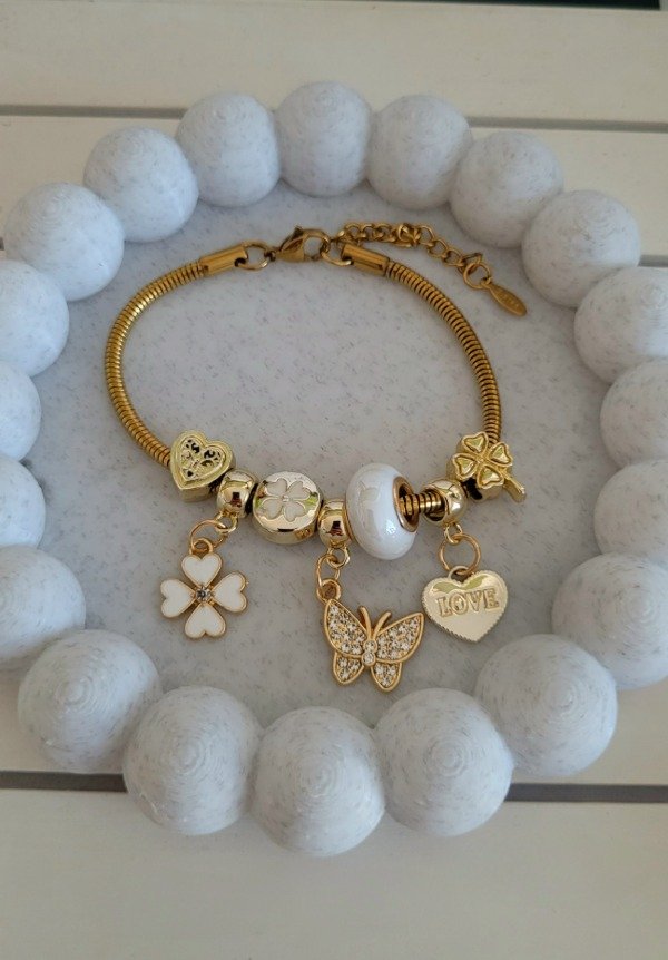 Producto - Pulsera simil pandora mariposa dona blanca de acero dorado