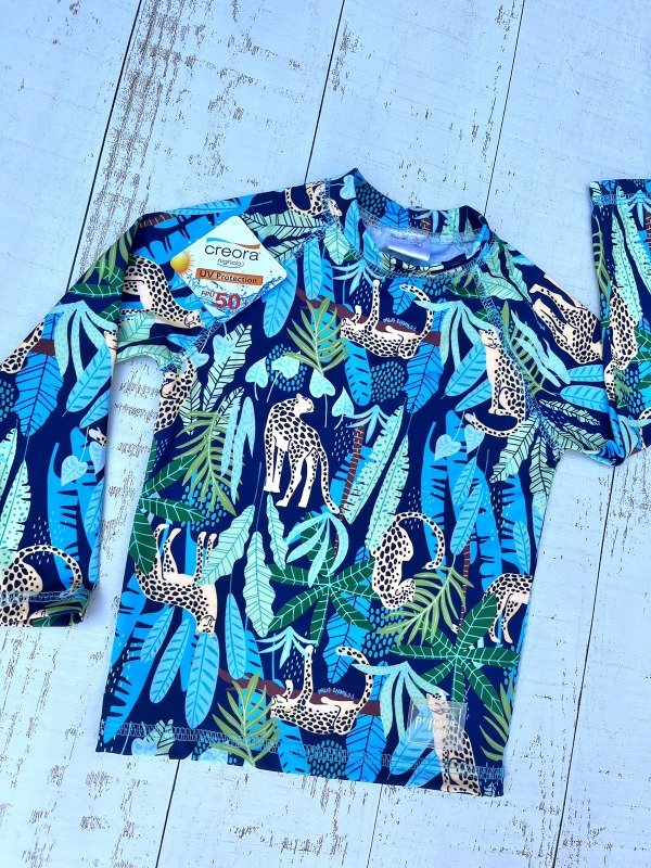 Producto - REMERA UV HOJAS CHITA