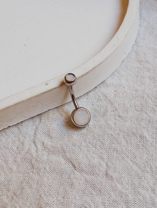 Producto - Piercing ombligo piedrita blanca - Acero quirúrgico
