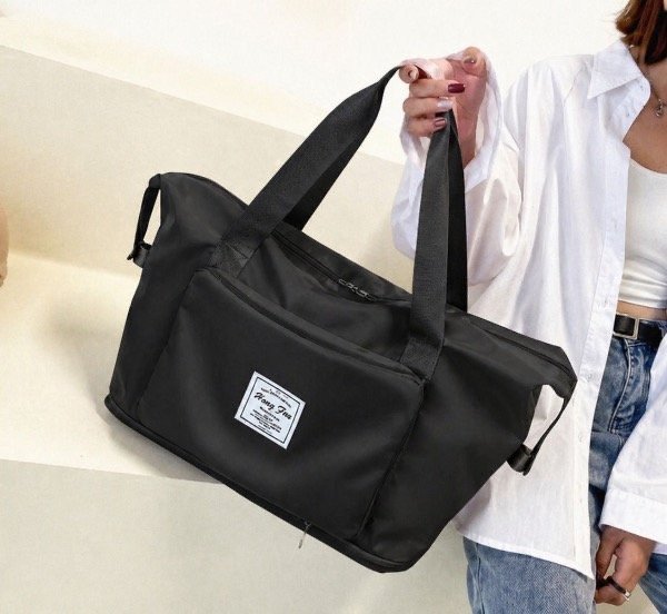 Producto - BOLSO IMPERMEABLE EXTENSIBLE - NEGRO