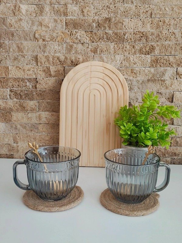 Producto - Set de 2 tazas negras con 2 cucharitas de regalo