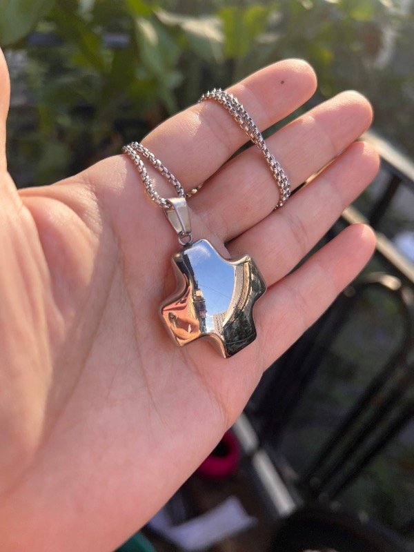 Producto - Collar de acero Cruz del equilibrio infalda