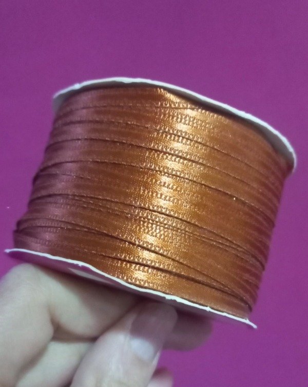 Producto - REMANENTE CINTA DE RASO NÚMERO 0 COLOR BRONCE X 99 METROS