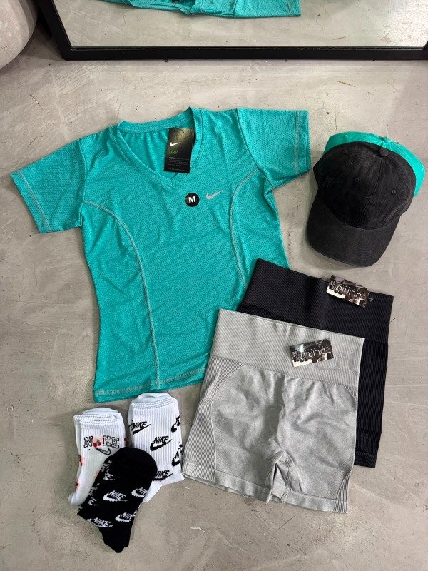 Producto - REMERA NIKE DRI-FIT DAMA (CURVA) - 12