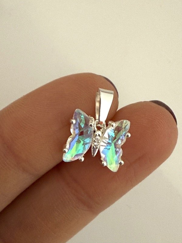 Producto - DB629 Dije mariposa tornasolada acero blanco 1 cm