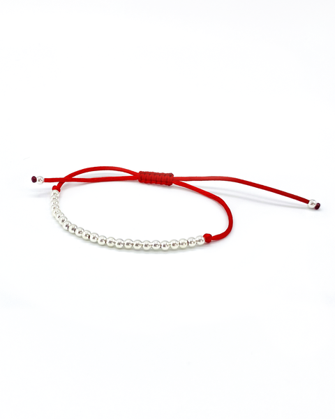 Producto - Pulserita roja con detalles en acero blanco