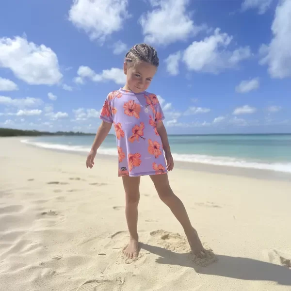 Producto - REMERA CON PROTECCION UV NIÑO - LILA CON FLORES  - ORIGAMI