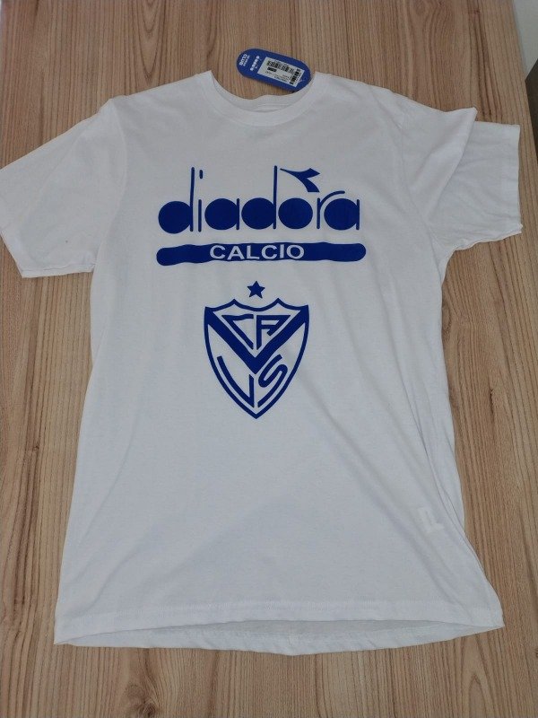 Producto - REMERA SALIDA DIADORA BLANCA
