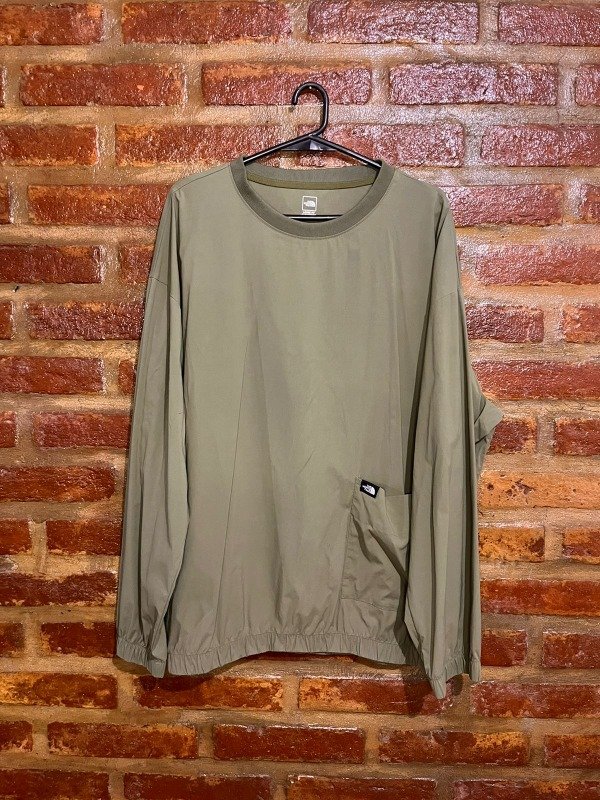 Producto - BUZO ROMPEVIENTO THE NORTH FACE