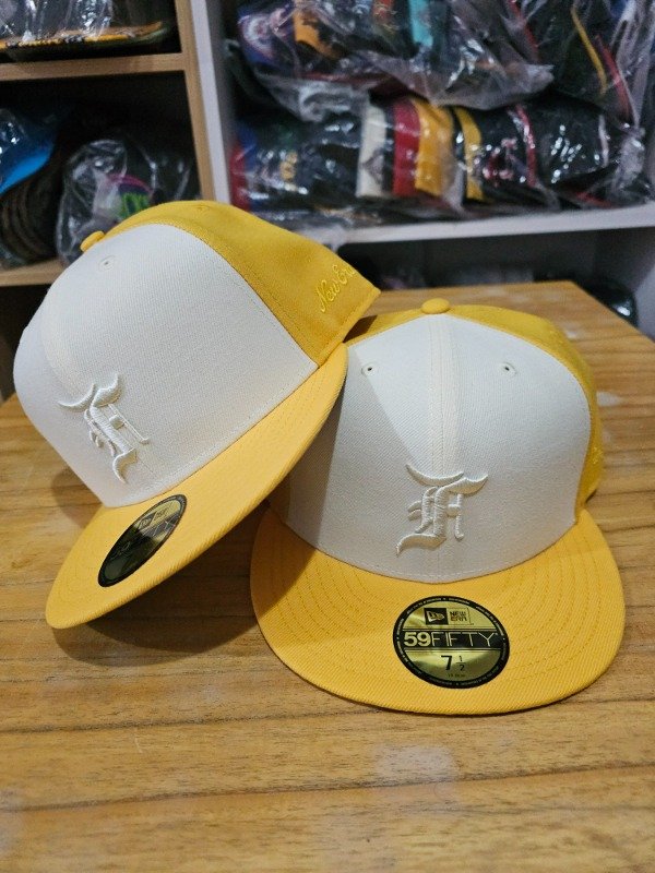 New era fear of god essentials yellow — imagen 2