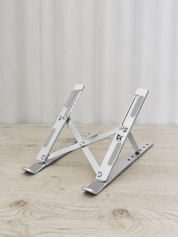 Producto - SOPORTE METÁLICO DE NOTEBOOK O TABLET PARA ESCRITORIO  REGULABLE PLEGABLE
