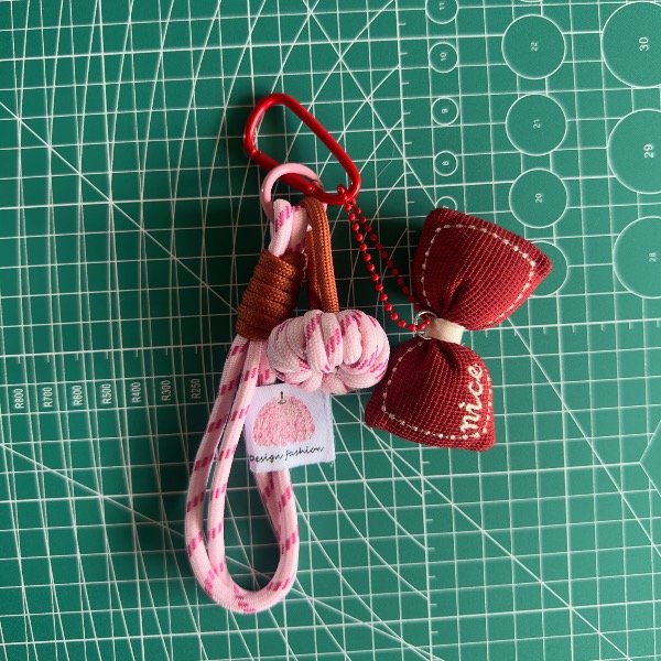 Producto - Charm moño rojo