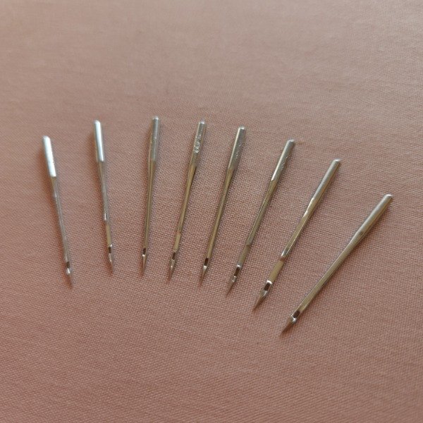 Producto - Agujas para máquina overlock Apple Needles