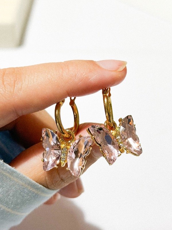 Producto - Argolla mariposa rosa cristal-acero dorado