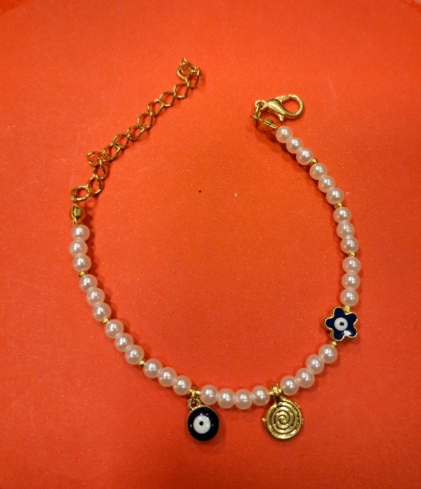 Producto - Pulsera Ojo Turco metal dorado con perlas blancas
