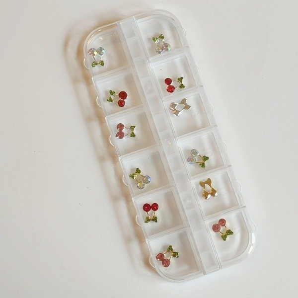 Producto - Dije cereza en cajita surtidos