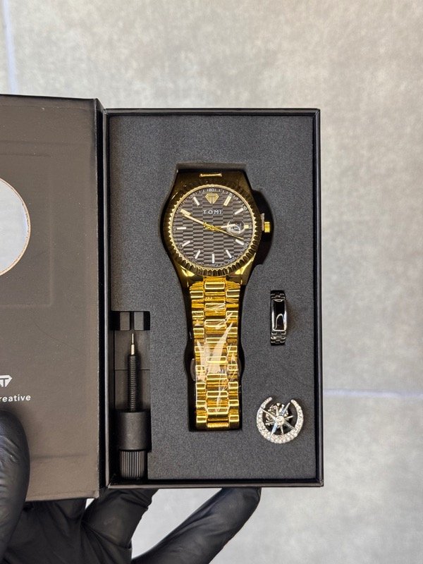 Producto - TOMI ORO NEGRO (caja)